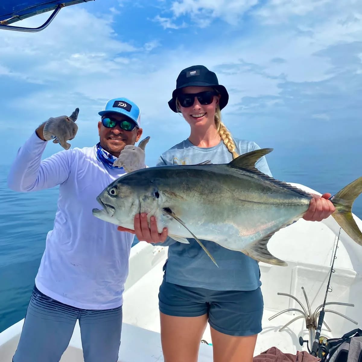 Jack crevalle with happy angler