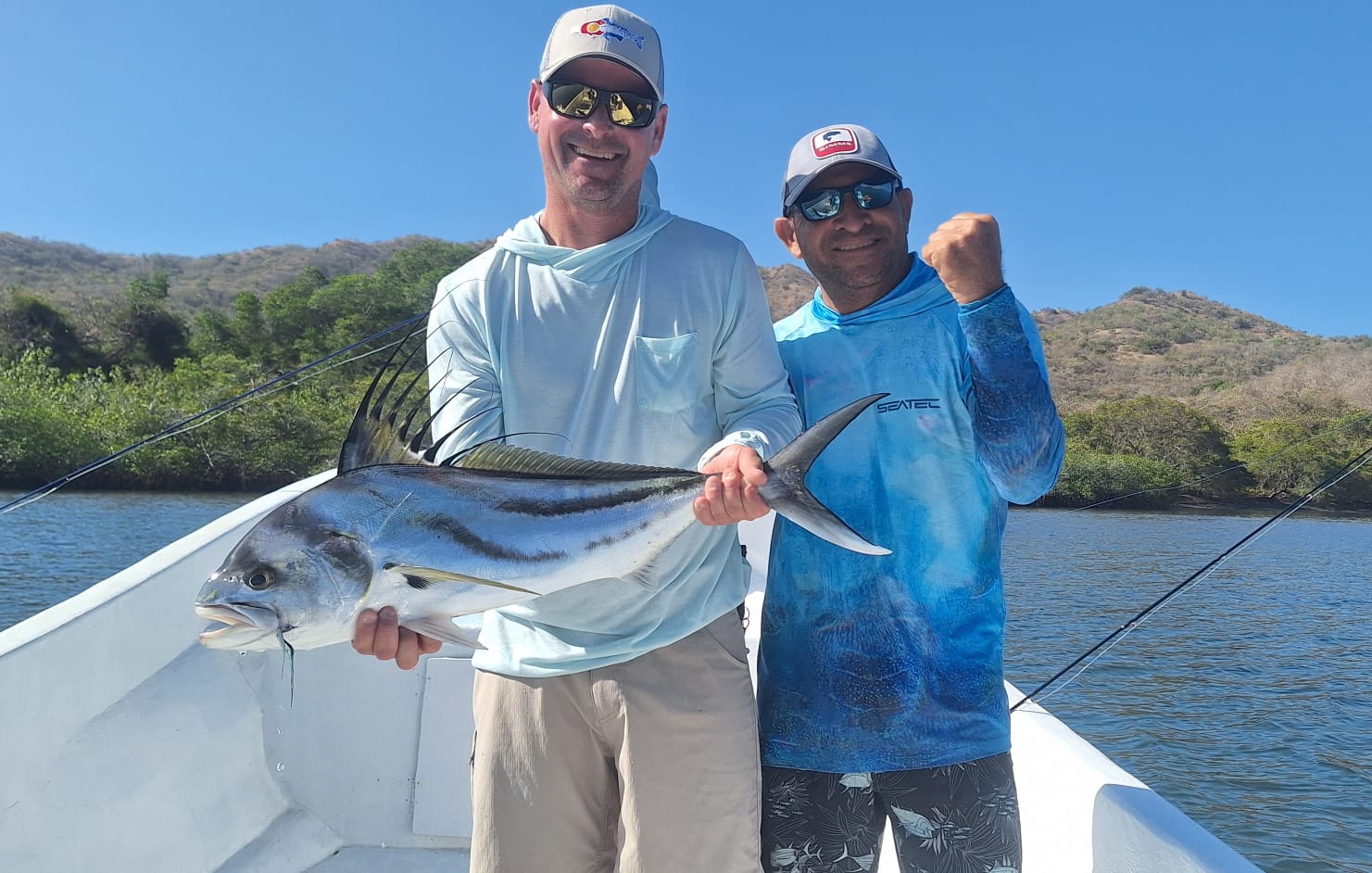 Two anglers with roosterfish