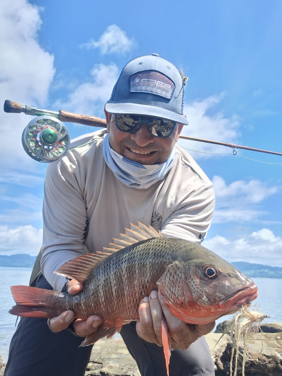 Snapper on the beach with fly reel